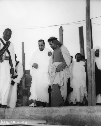 King Saud, with Mohammed bin Laden at the Grand Mosque in Makkah during the Hajj season - 1955