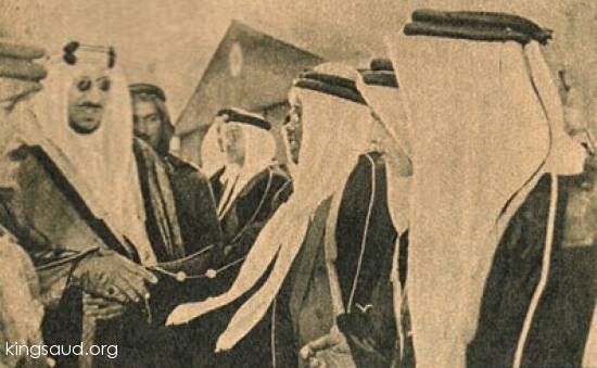King Saud during the reception by the Saudi community at the airport with Mr. Taher Zamakhshari poet and head of the spical programs of the Radio Station