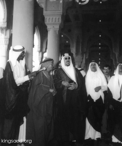 King Saud and Sheikh Mohammed bin Laden discussing the expansion project with broadcaster Bakr Younis - 1955