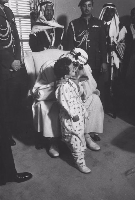 King Saud Kissing his son Prince Mashor at Walter Hospital in wasington in 1957 .
