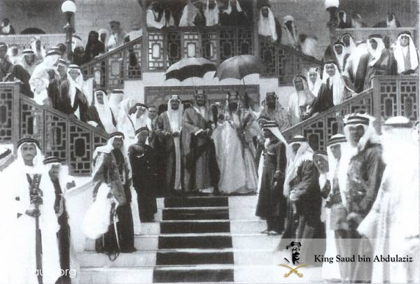 King Abdulaziz at the palace of Shaikh Hamad Bin Eissa Al Khalifah, the Amir of Bahrain accompanied by Crown Prince Saud, Prince Faisal Bin Abdulaziz, prince Mohammad bin Abdulaziz and several members of the royal family. Manama, 1939