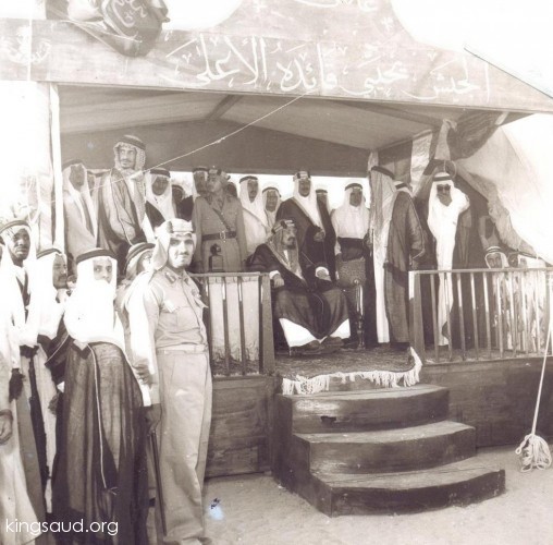 King Abdulaziz with Crown Prince Saud, and sons:Nassir,Talal, Nawaf, Abdullah,Mitaib,Mishaal, and Faisal bin Turki.  during an Army Parade.1952