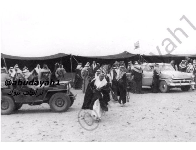 King Saud visit to Tabuk during the welcome ceremony held by Sheikh Saleem Abo Demayik The Sheikh of Bin Atiya Tribe - 1954