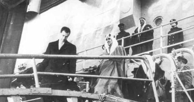 King Saud descends from the ship during his arrival from one of his visits