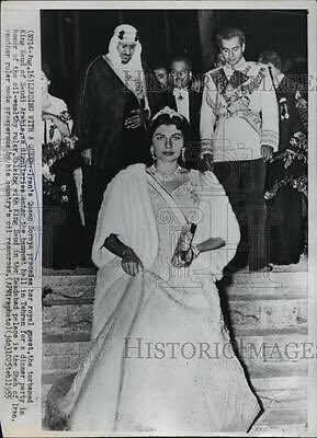 King Saud with Emperor Mohammad Reza Pahlavi and his wife, Empress Soraya Bkhittar, and in the stands behind the private secretary of the king and Information Minister Sheikh Abdullah Balkhair 1955
