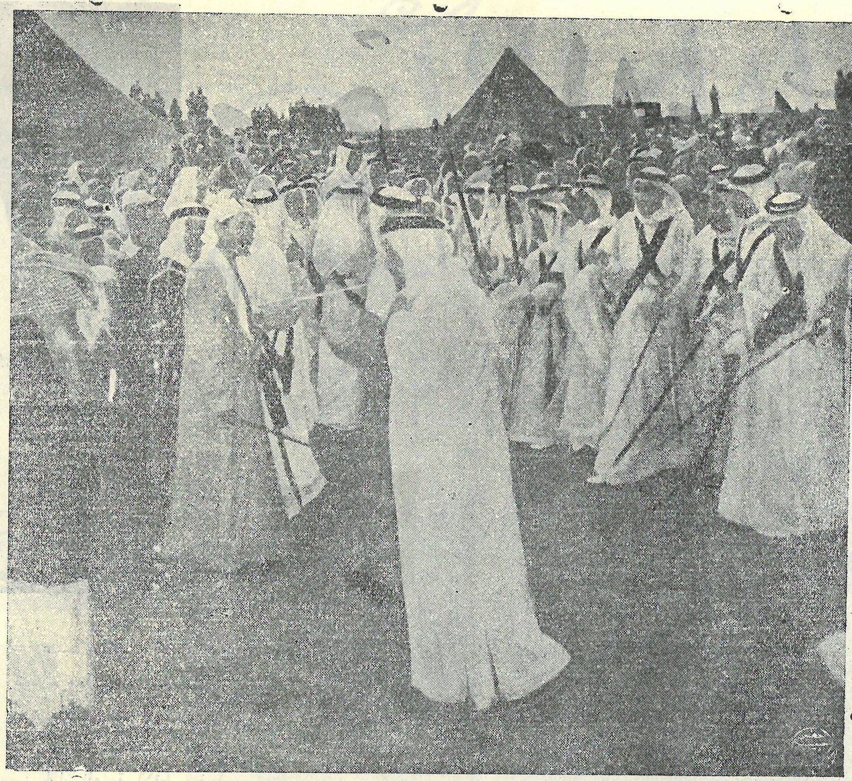 Crown Prince performing traditional Ardha with other princes in the presence of King Saud