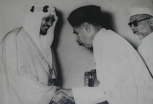  The visit of H.M. King Saud Bin Abdulaziz Al Saud of Saudi Arabia to India, November, December, 1955.  Pro-Chancellor of the Muslim University Aligarh, Nawab Chattari, presenting a golden garland to H.M. the King Saud at a special convocation held at Ali