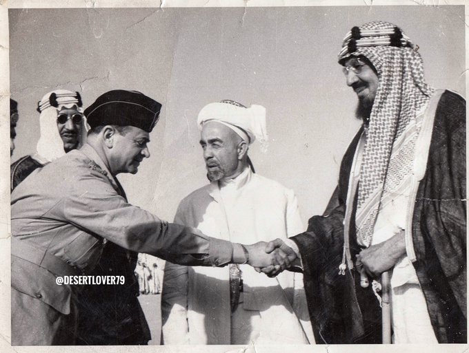 King Abdulaziz shaking hands with Deputy Supreme Commander of the Jordanian Army Abdul Qader Al-Jundi, seen in the photo is King Abdullah of Jordan and Crown Prince Saud - 30th June, 1948