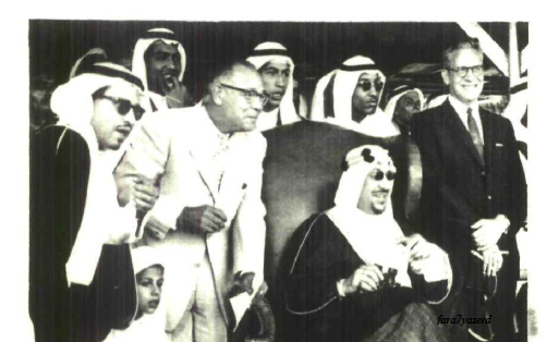 King Faisal of Iraq with Prince Abdullah bin Galloway at a gala dinner held during his visit to the Eastern Region, 1945