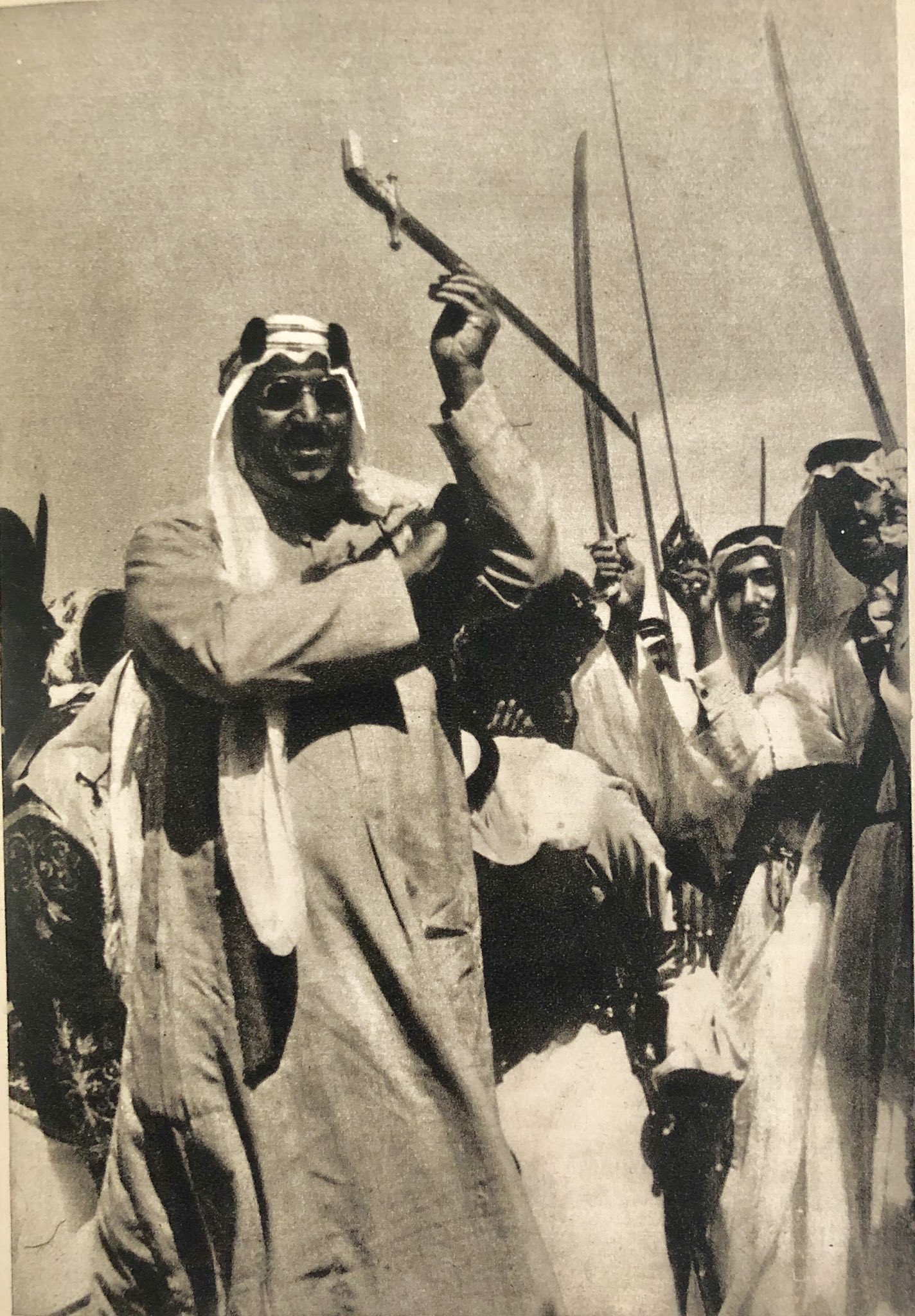 King Saud performing the ( Ardha) the war dance with his sons Prince Mussad and Prince Saad