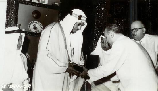 King Saud is Presented with a gift in Beirut 1954 with his sons Mansour and Abdulilah.