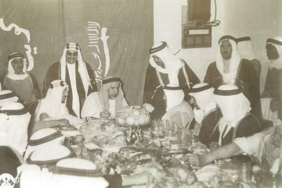 King Saud at a banquit which was given in the honor of Shaikh Abdallah Al Salem Al Sabah Amier of Kwait during his visit to Riyad. Al Rawdah Palace