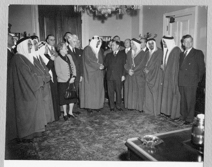 Members of the Foreign Affairs Committee of the House of Representatives are presented to His Royal Highness Crown Prince Saud Al-Saud of Saudi Arabia. Standing in the front row (left to right) are three unidentified members of the Prince's party, Mrs. Bolton, Mr. Eaton, Crown Prince Saud Al-Saud, Speaker Joseph Martin, three unidentified members of the Prince's party, Mr. Merrow. Standing in the second row (left to right) are unidentified , Mr. Jonkman, Mr. Lodge, Mr. Jarman, Mr. Bloom, Mr. Ric