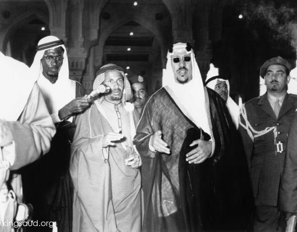 King Saud during his inspection of the expansion in the Holy Mosque and Sheikh Mohammed bin Laden 1374 AH 1955 AD.