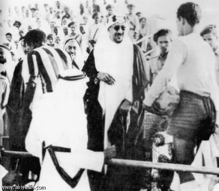 King Saud congratulates the winning team "Al Ittihad" against "Al-Hilal" on the King's Cup at Al-Sayegh Stadium in Riyadh - 1963