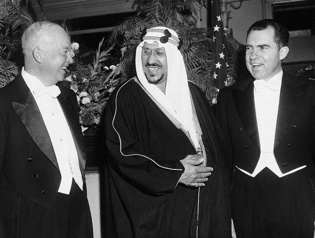 King Saud of Saudi Arabia with President Eisenhower and Vice President Richard Nixon as they attended the regally-arranged dinner given by the Arabian monarch at the Mayflower Hotel in Washington D.C. in 1957