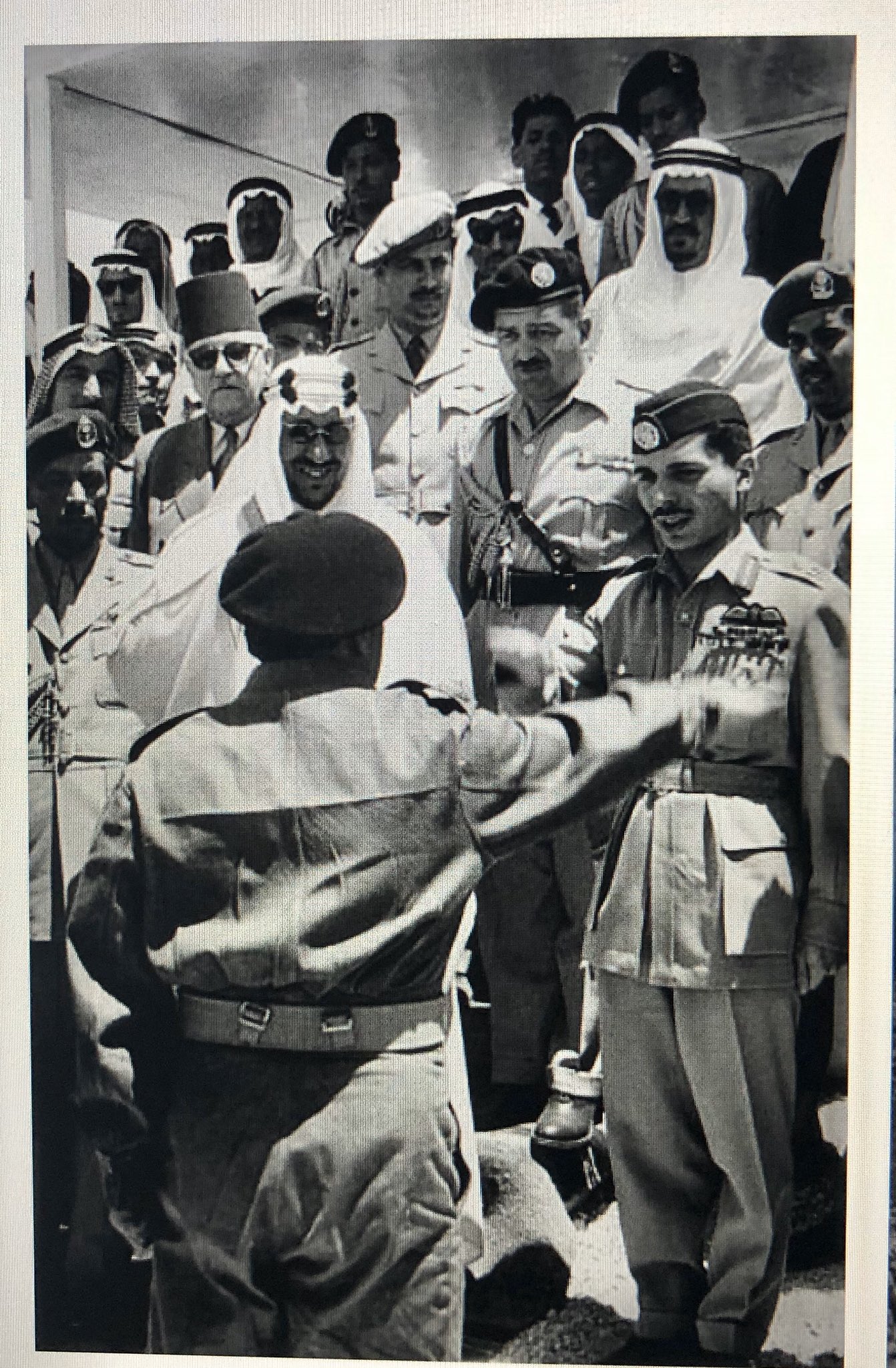 1373 King Saud and Jordans King Hussein Greeting military officers