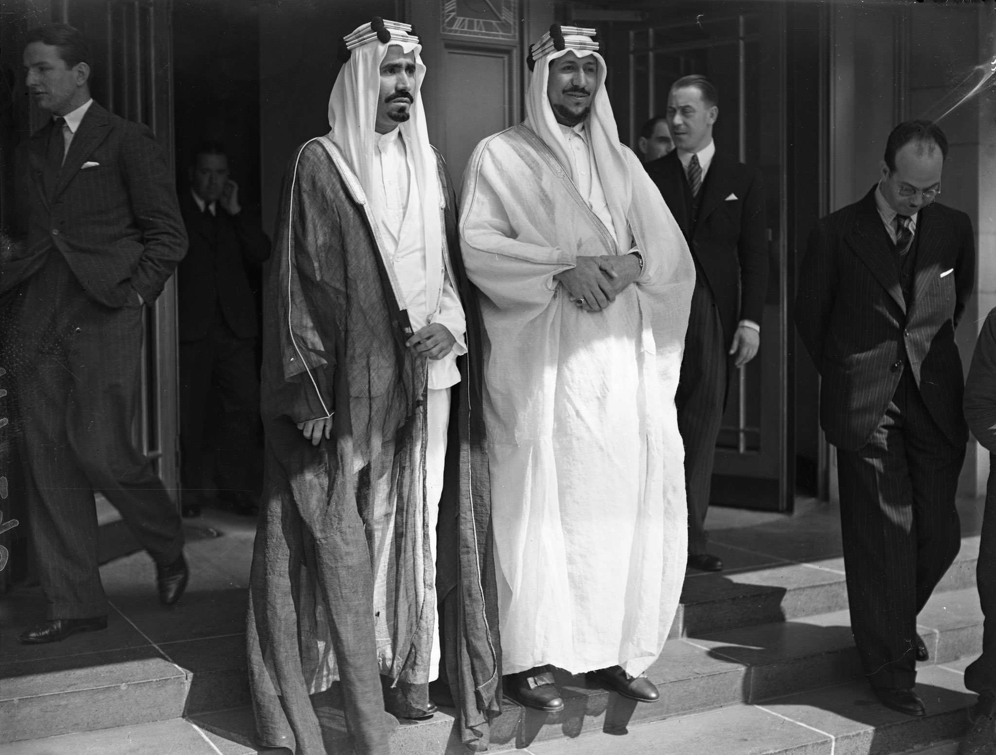 Crown Prince Saud and his brother Prince Mohammed, Hafez Wahba and Zarkali arrive at Victoria Station to attend the coronation of King George VI - 7/5/1937