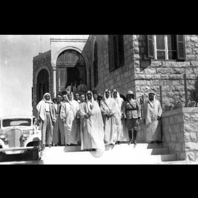 Crown Prince Saud at the railway station in Haifa, along with Fuad Hamza, Khairuddin Zarkali and British Governor - 1936