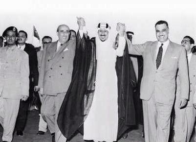 King Saud between President Shukri Al Quatli of Syria and Jamal Abdul Naser of Egypt