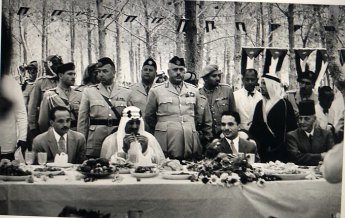 King Saud during his visit to Jordan as the guest of King Hussein, accompanied by the Jordanian Prime Minister Ibrahim Hashim, on 16 January 1957, with Prince Mohammed bin Turki standing behind him — may they rest in peace.