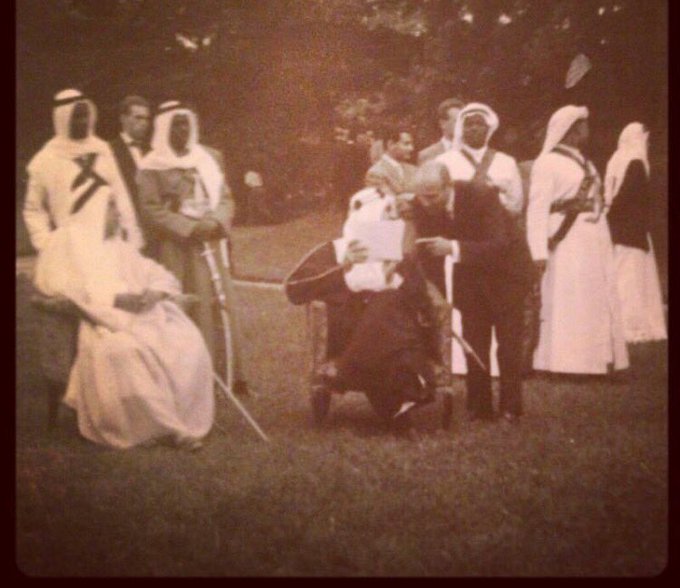 Sheikh Ali bin Abdullah, the Ruler of Qatar, in the garden of his Sanssouci Palace in Geneva, accompanied by King Saud — may God have mercy on them both.