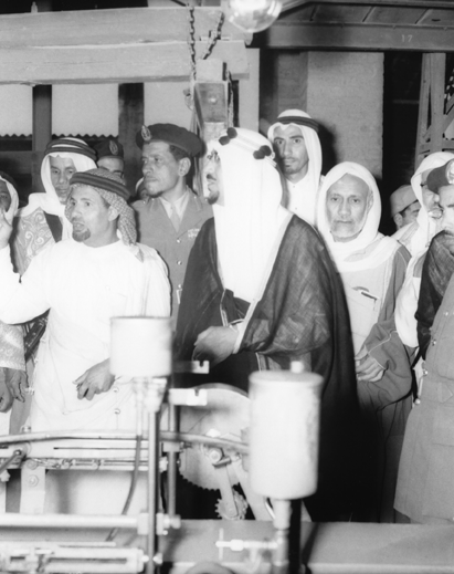 His Majesty King Saud — may he rest in peace — during his visit to the brick factory in Al‑Madinah Al‑Munawwarah.