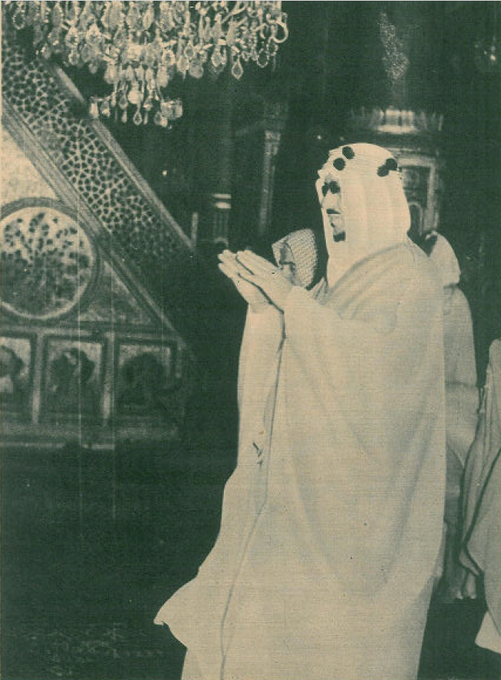 King Saud praying in the Rawḍah al‑Sharīfah beside the Noble Minbar in Al‑Madinah Al‑Munawwarah, following the completion of the first Saudi expansion of the Prophet’s Mosque.