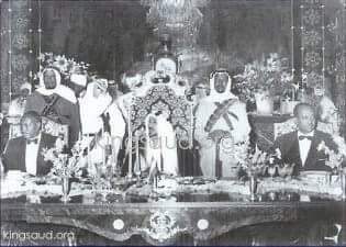 King Saud — may God have mercy on him — during a dinner banquet held in honor of Sudanese Prime Minister ʿAbdullah Khalil (right) and Foreign Minister Muhammad Mahgoub.