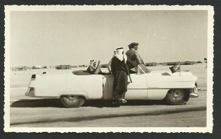 King Saud—may God have mercy on him—on his way to a military parade in Dhahran in 1954.