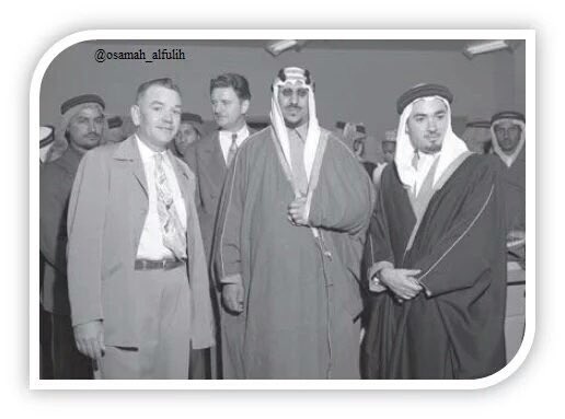 King Saud—may God have mercy on him—together with Fahmi Basrawi during the first television broadcast in Saudi Arabia, transmitted from Dhahran in September 1957.