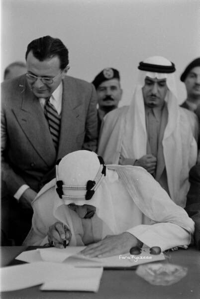 King Saud, with Prince Fahd bin Saud and Sayf al‑Islām al‑Badr behind him, together with Kings Hussein and Faisal II, in discussion during the Beirut Summit of 1956.
