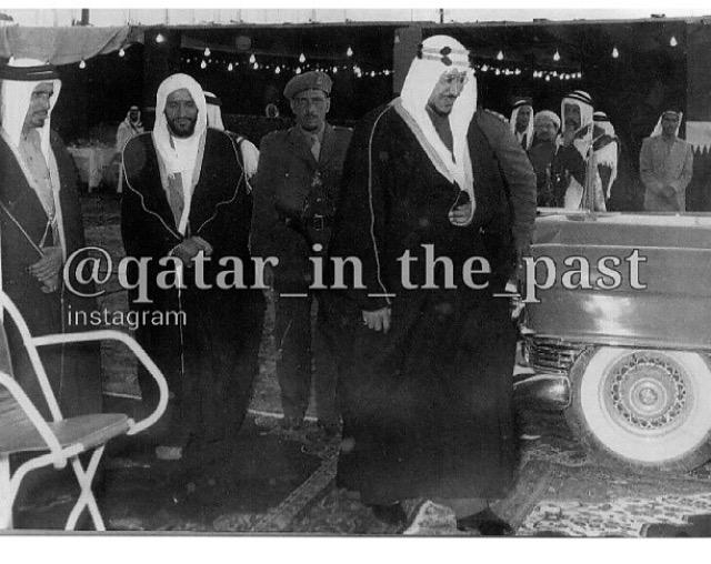 King Saud with the Amir of Qatar, Sheikh Ahmed bin Ali Al Thani, and Qasim bin Duraish Fakhro in Doha in 1959 at the residence of Sheikh Abdullah Al‑Duraish.