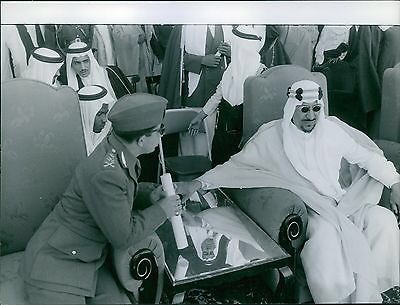 King Saud receiving King Faisal II of Iraq — may God have mercy on them — as they observe military maneuvers in 1957.