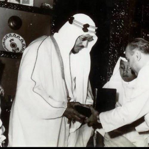 King Saud receiving a commemorative shield in Beirut in 1956, accompanied by his son Prince Mansour bin Saud.
