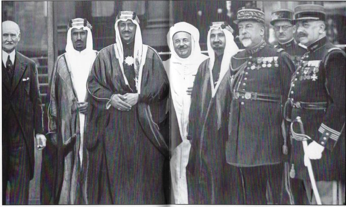 Prince Saud bin Abdulaziz in London for the coronation of King George VI, accompanied by the Moroccan monarch Mawlāy Yūsuf, Prince Mohammed bin Abdulaziz, and Sheikh Yusuf Yasin, in 1937.