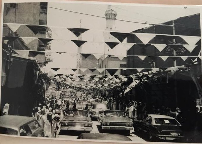 A photograph of King Saud’s motorcade on Bab al‑Salam Street in Al‑Madinah Al‑Munawwarah, following his blessed visit and prayer at the Prophet’s Mosque.