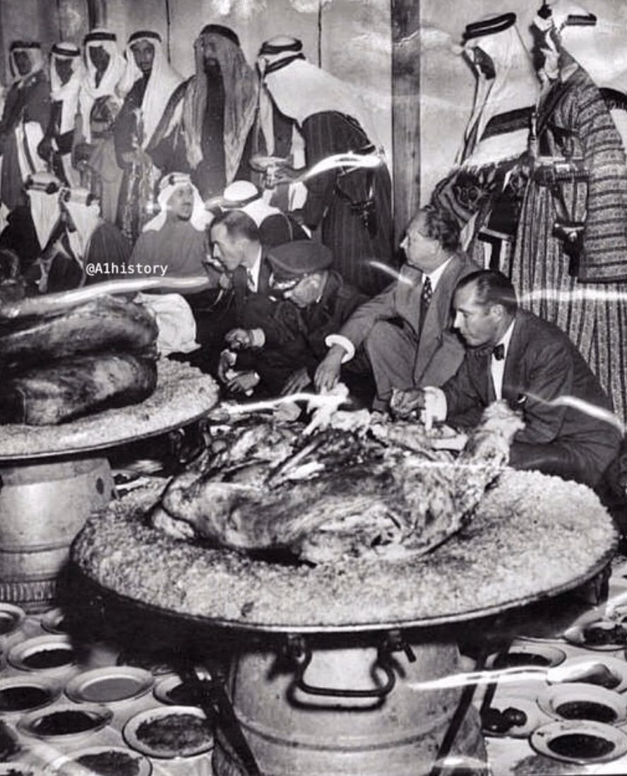 A luncheon hosted by Prince Saud bin Abdullah bin Jiluwi in honor of King Saud and Sheikh Isa bin Salman Al Khalifa—may God have mercy on them—in Dammam, 1954.