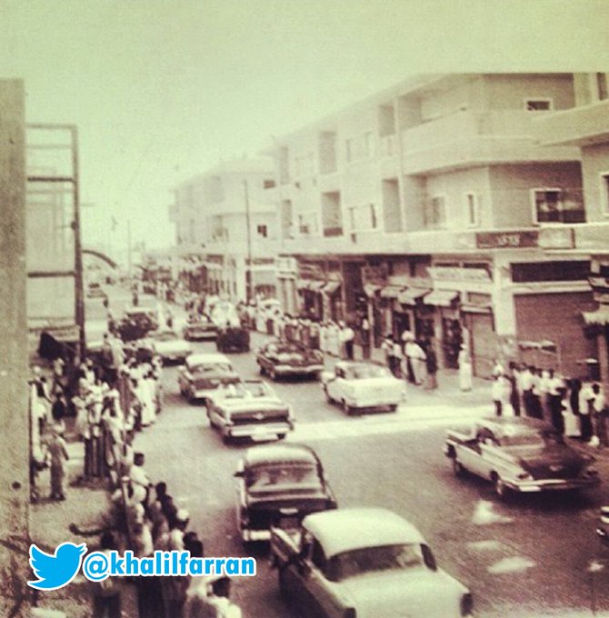 From the memory of the city of al‑Khobar: a photograph of the motorcade of King Saud bin Abdulaziz—may God have mercy on him—on King Khalid Street during his visit to the Eastern Province in the early 1960s.