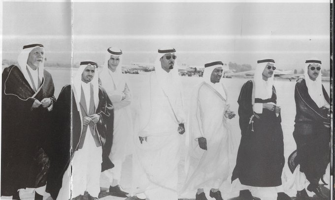 From right: Princes Badr bin Abdulaziz, Abdulmohsen bin Abdulaziz, Ahmad bin Abdulrahman (brother of King Abdulaziz), Abdullah bin Abdulaziz, Abdulmajid bin Abdulaziz, Fahd bin Mohammed bin Abdulaziz, and Sheikh Jamal al‑Husseini, receiving King Saud at Beirut Airport — 1374 AH.