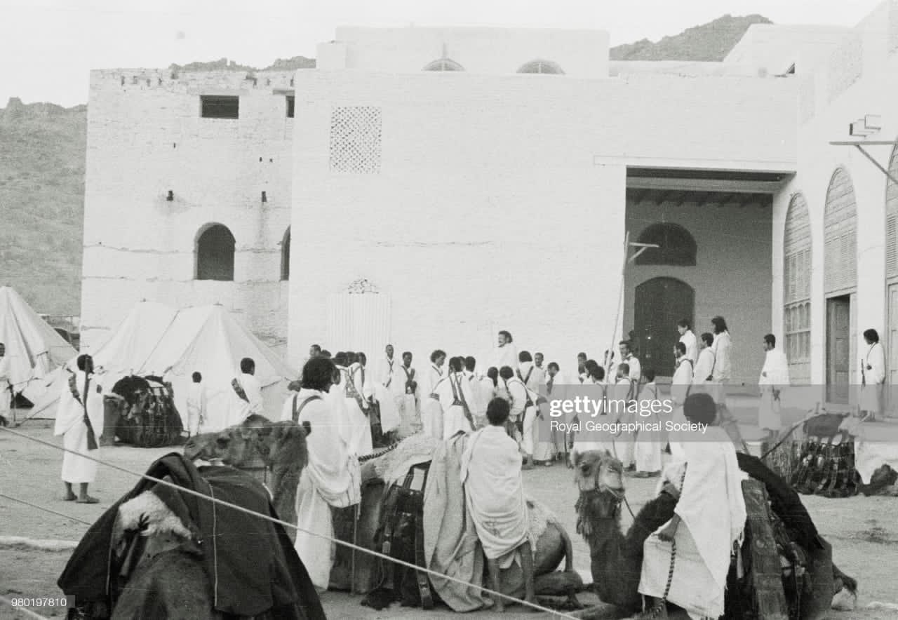 A photograph taken by Abdullah Philby in 1936 during the Hajj in Mina, showing King Abdulaziz, may God have mercy on him, with his family and men on their way to Arafat, with Crown Prince Saud behind him.