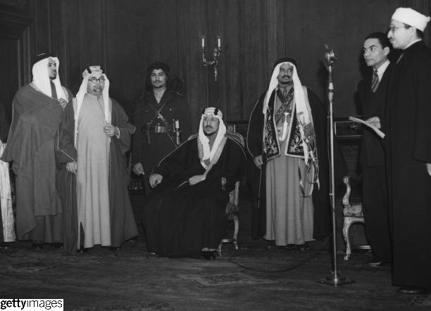 Crown Prince Saud (later King Saud) attended a reception held in his honor at the Islamic Centre in Regent’s Park, London, on 27 February 1947. Ambassador Hafiz Wahba and Mohammed Ali Reza are seen in the gathering