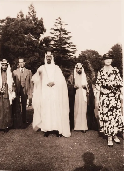 Crown Prince Saud in London, accompanied by Hafiz Wahba and Lady Evelyn Cobbold — the first British Muslim woman to perform the Hajj in 1933.