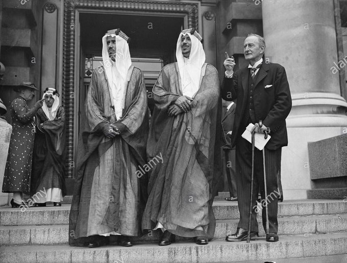 Crown Prince Saud—later King Saud—and his brother Prince Mohammed bin Abdulaziz, together with Major Gratham, the official responsible for the International Coordination Committee (ICC), in front of the London City Council Hall on 13 July 1937 — may God have mercy on them all.