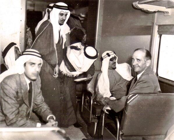 Crown Prince Saud and King Abdulaziz may God have mercy on them around 1953 Prince Talal appears in the back