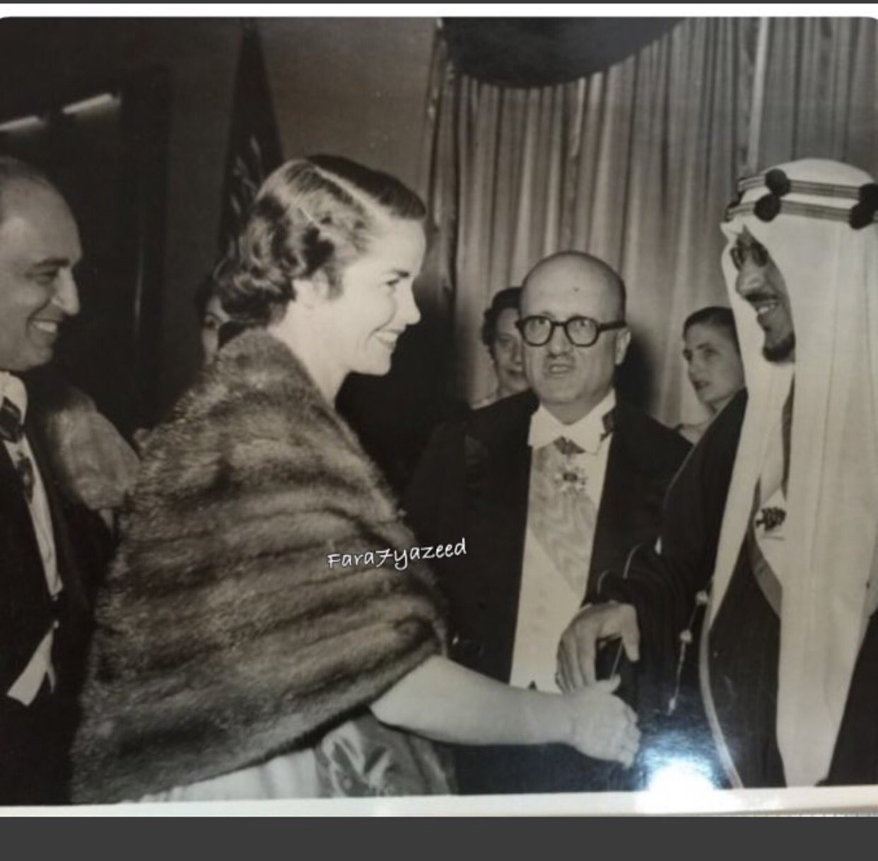 Crown Prince Saud at a ceremony hosted by Lebanese President Camille Chamoun, during which he was decorated with the Order of the Cedar, in Rajab 1372 / 9 April 1953.