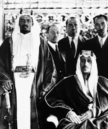 Crown Prince Saud surrounded by Khayr al‑Din al‑Zarkali, Dr. Medhat Sheikh al‑Ard, and his senior escort Ṣāliḥ al‑ʿAlī al‑Sālim during the coronation ceremonies of King George VI in London in 1937.