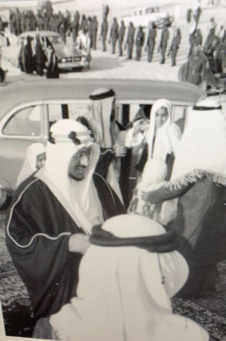 The arrival of King Saud—may God have mercy on him—to the Eastern Province, where he was received by its governor, Prince Saud bin Abdullah bin Jiluwi. Also visible are the King’s sons, Prince Khalid and Prince Abdulmajid—may God have mercy on them all. Dhahran – Dammam – al‑Khobar, 1954.